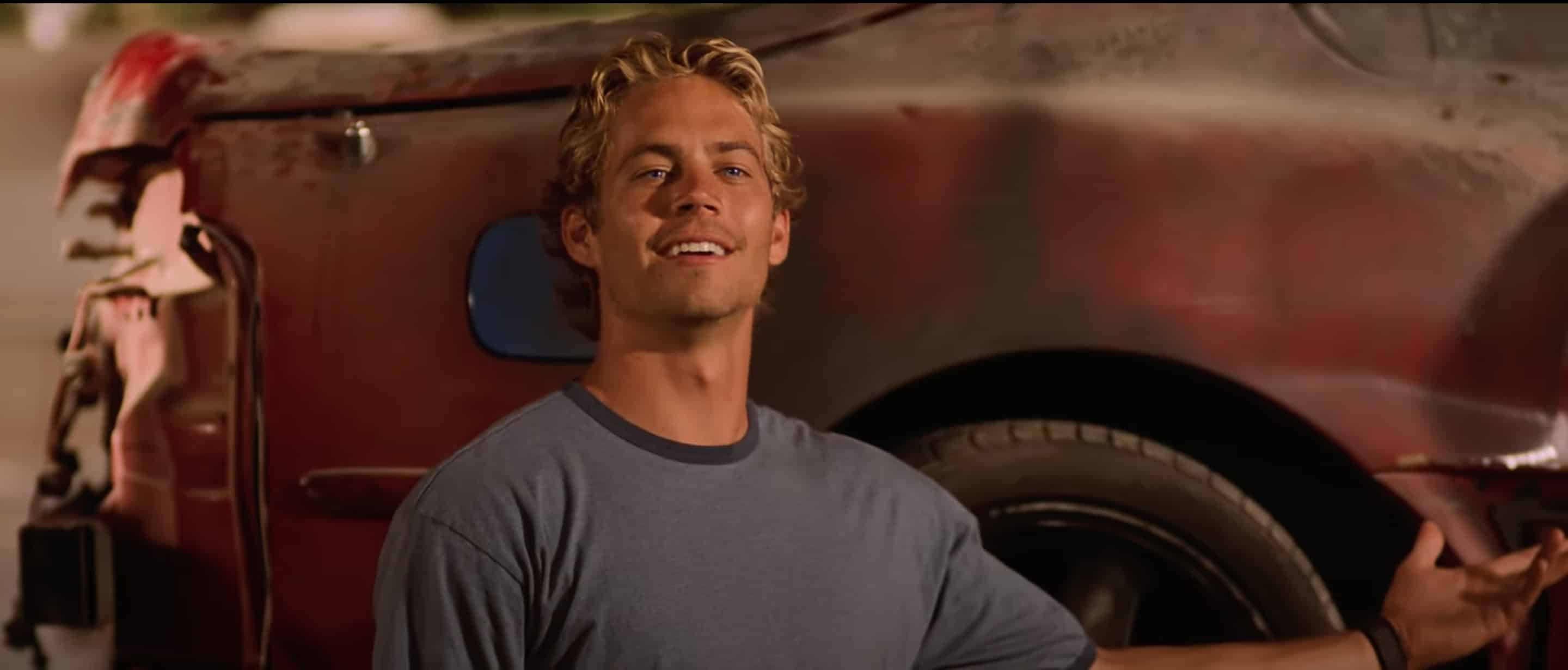 Paul Walker dans Fast and Furious 1 devant la Toyota Supra
